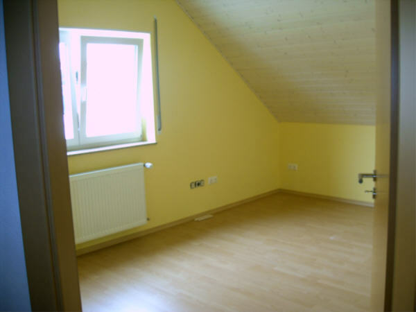 Bedroom 2 on the top floor (13.7sqm)