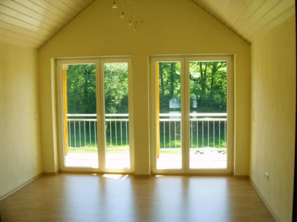 Bedroom 1 on the top floor (16.4sqm) with wide windows to the balcony.
On the left (not on the picture) is a door to a small dressing room (4.2sqm).