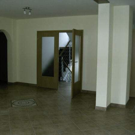Door from living room to the stairwell in 1st floor